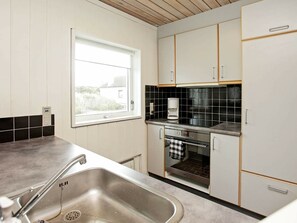 Coffee/tea maker, fridge, stovetop, dishwasher