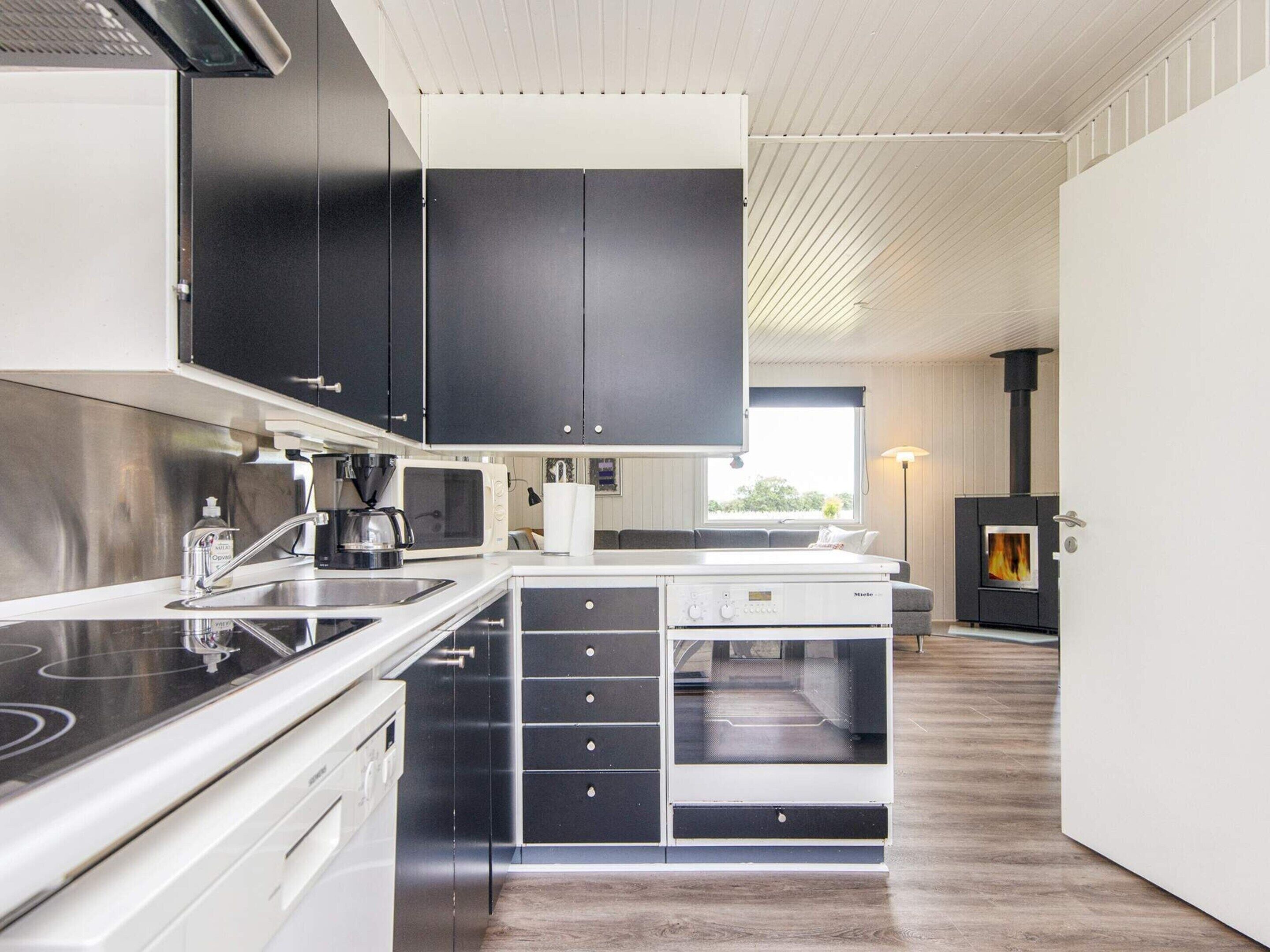 Casa | Cozinha privada | Cadeirão de bebê