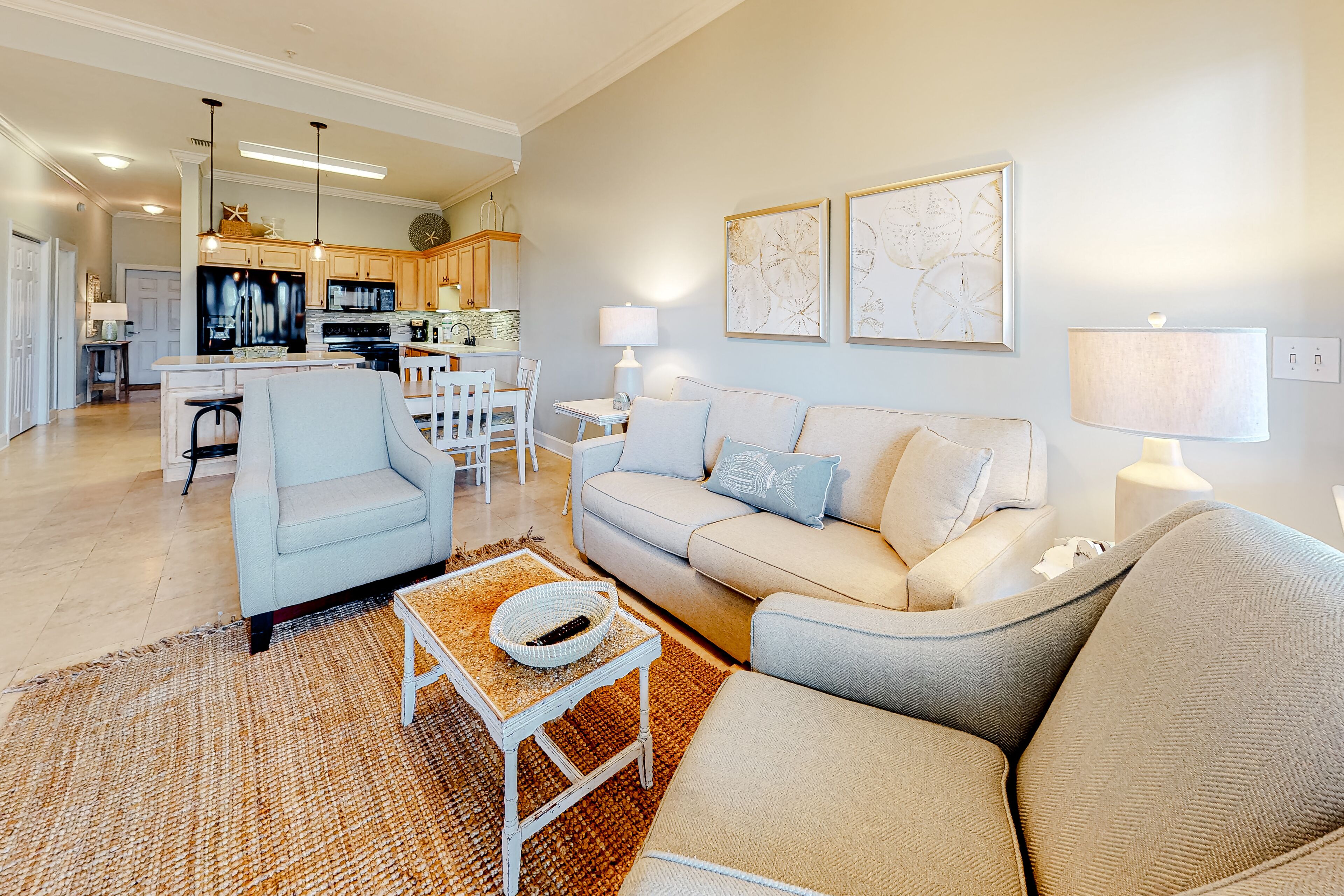 Stylish coastal condo with bikes & pool - near bike paths & the beach