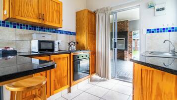 Habitación | Cocina privada | Frigorífico