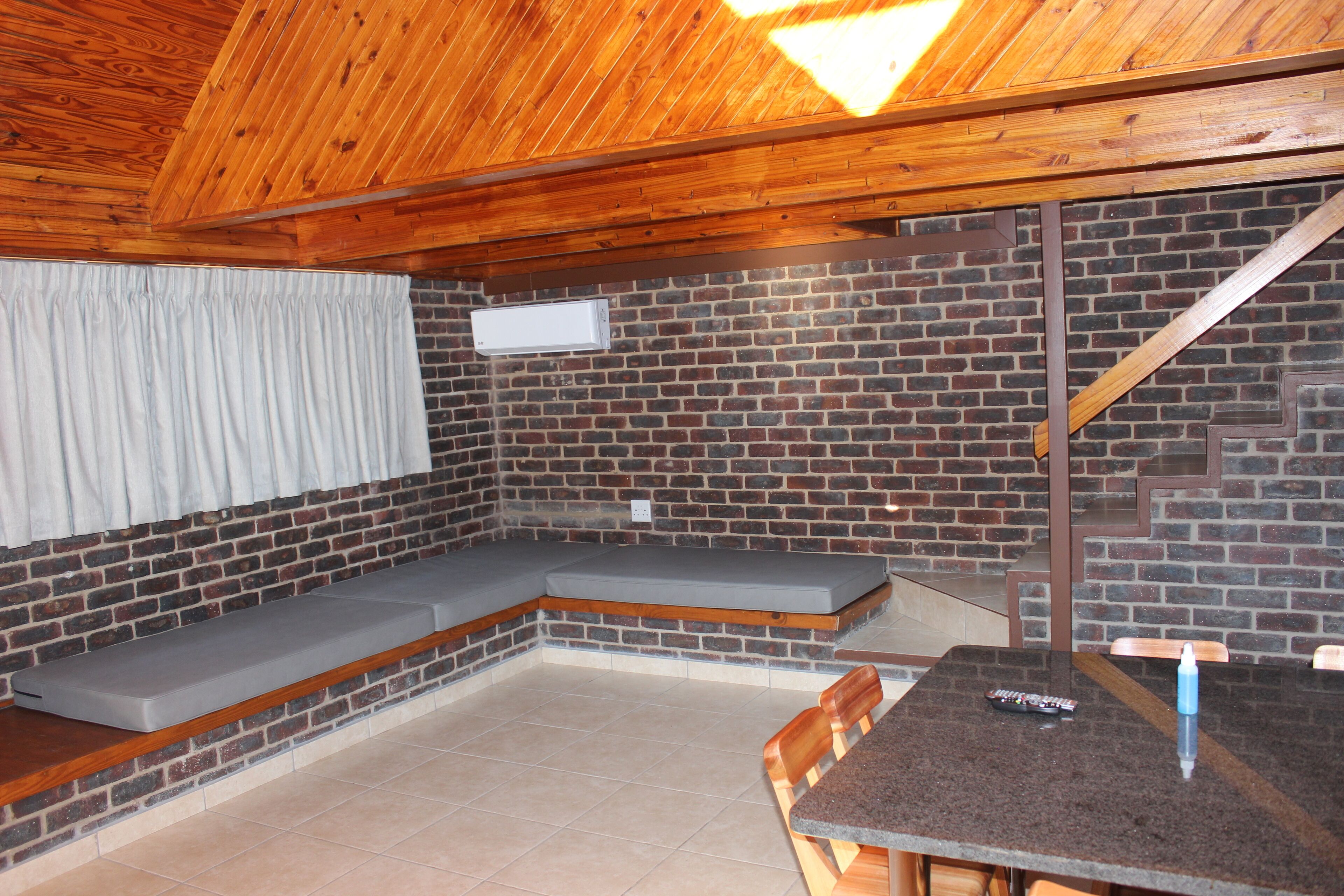 6 sleeper mountain cabin 3* (duplex) (7) | living area | 32-inch tv with satellite channels, ping pong