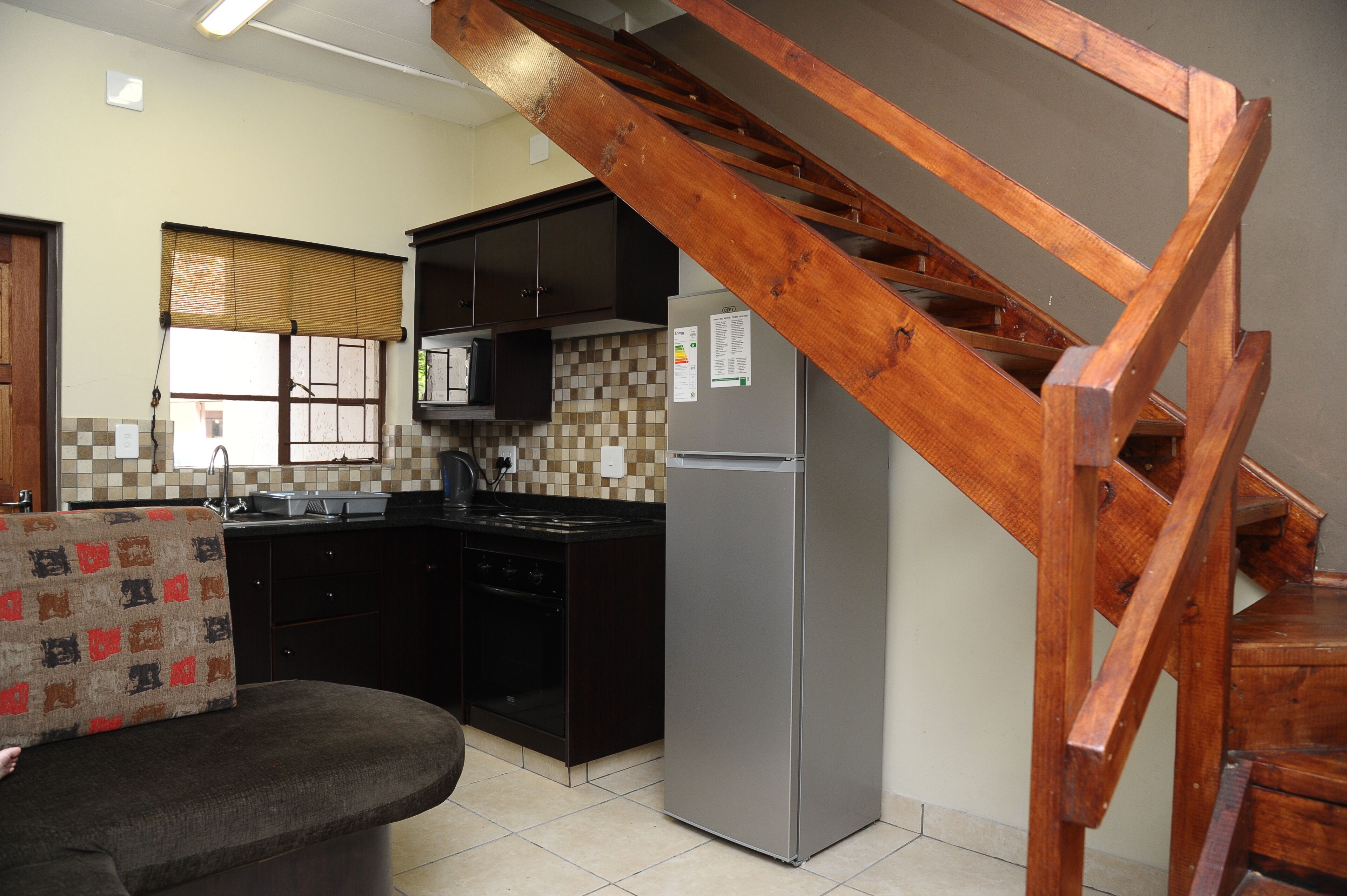 4 sleeper flat c (17) | living area | 32-inch tv with satellite channels, ping pong