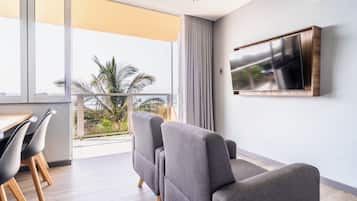 6 Sleeper Upgraded Flat with Balcony (26) | Living area | 32-inch TV with satellite channels, ping pong