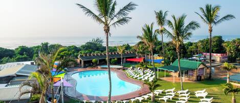 Outdoor pool, sun loungers, lifeguards on site