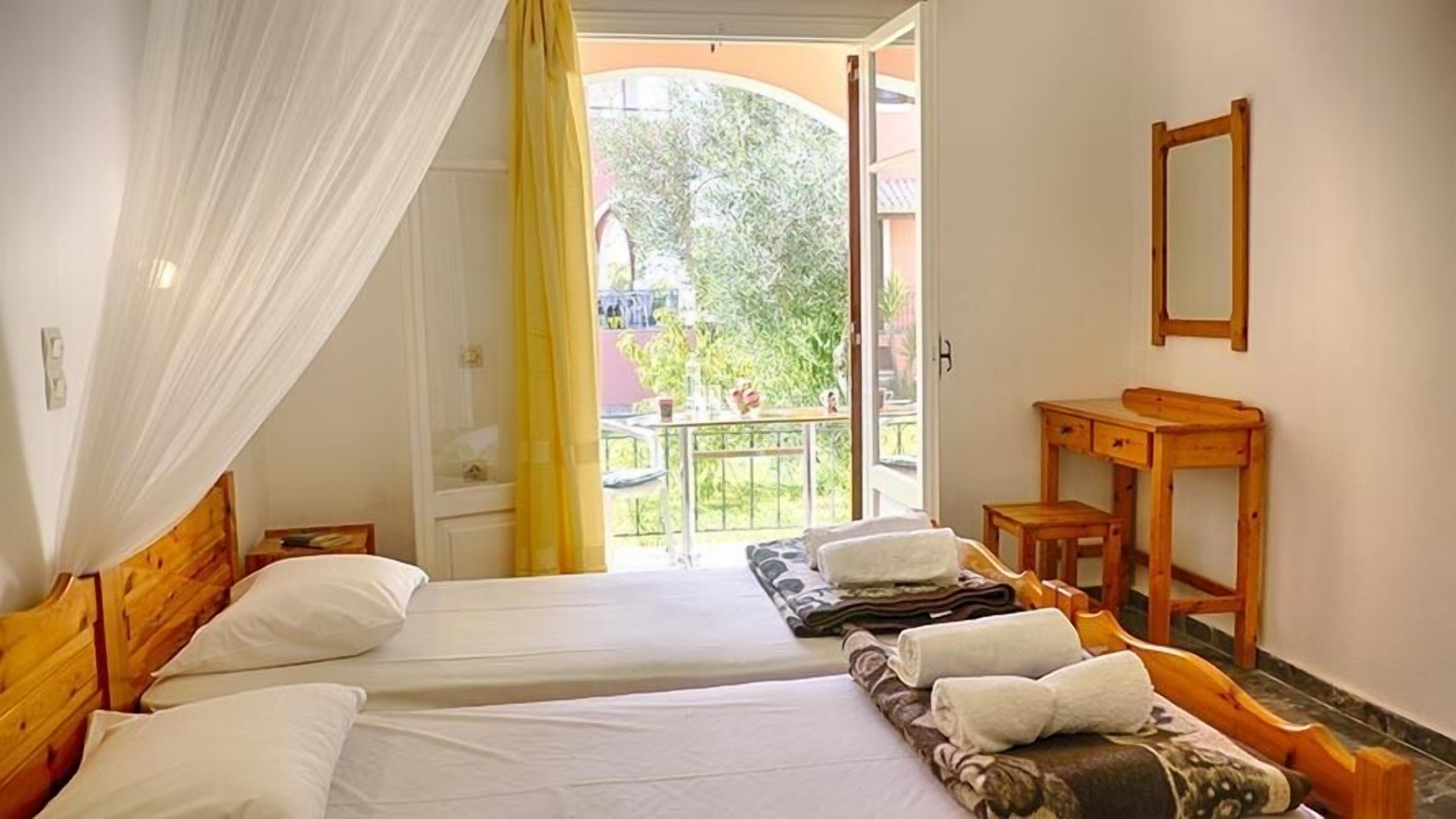 Dora Apartment 1 - in a quiet location only 300m from the sandy beach - in the bay of Agios Geo