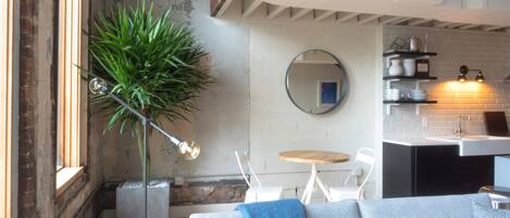 Loft 302 - 1.5 bath | Living area | 38-inch flat-screen TV with cable channels, TV