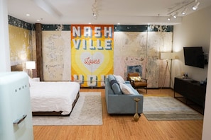 Loft  203 | Living area | 38-inch flat-screen TV with cable channels, TV - 506 Lofts - Anchor Rentals (Nashville)
