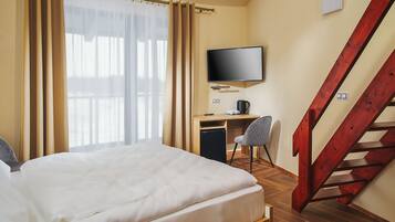 Firemannsrom | Oppholdsområde | Flatskjerm-TV og oppvarmet gulv