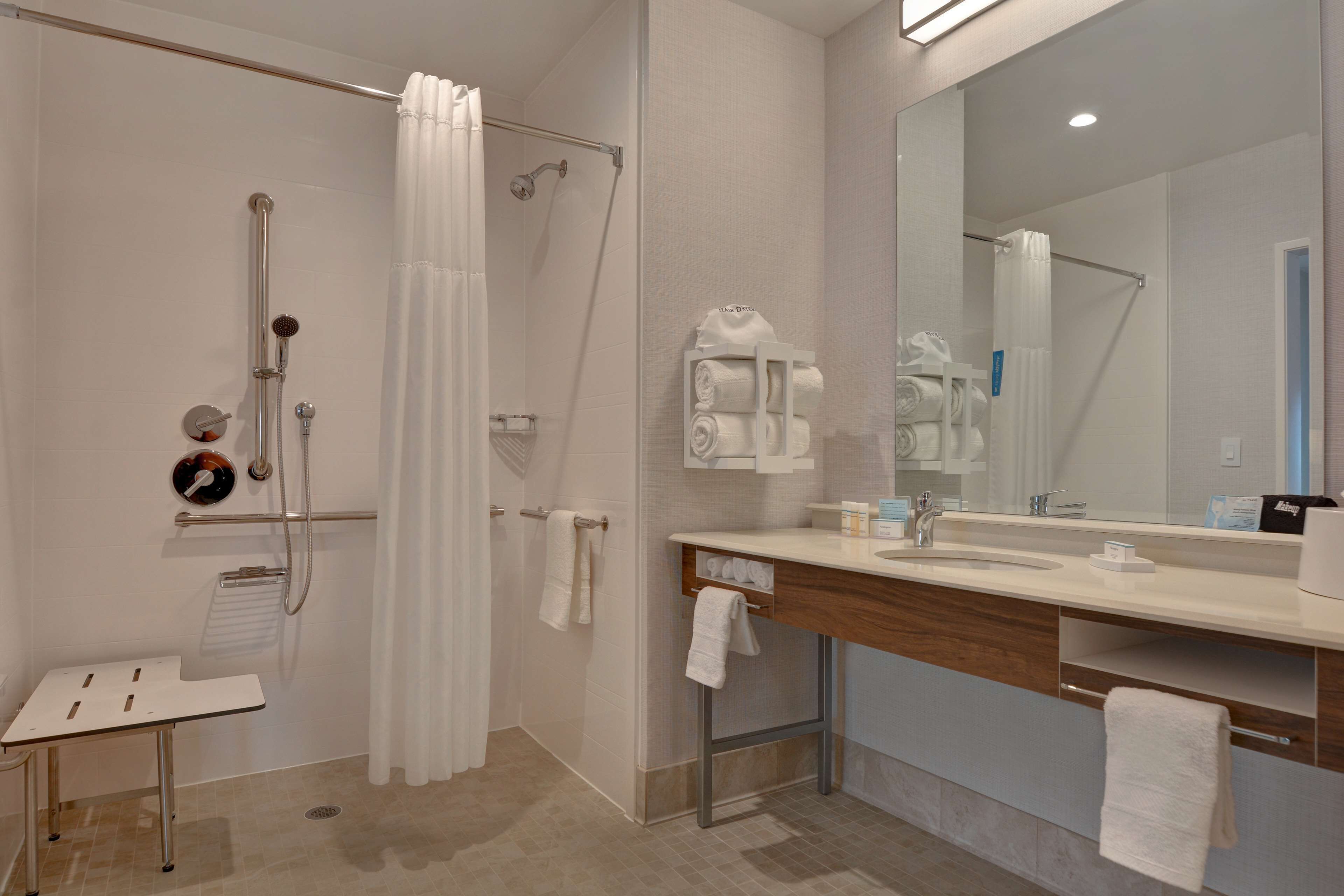 hair dryer, towels, soap, shampoo