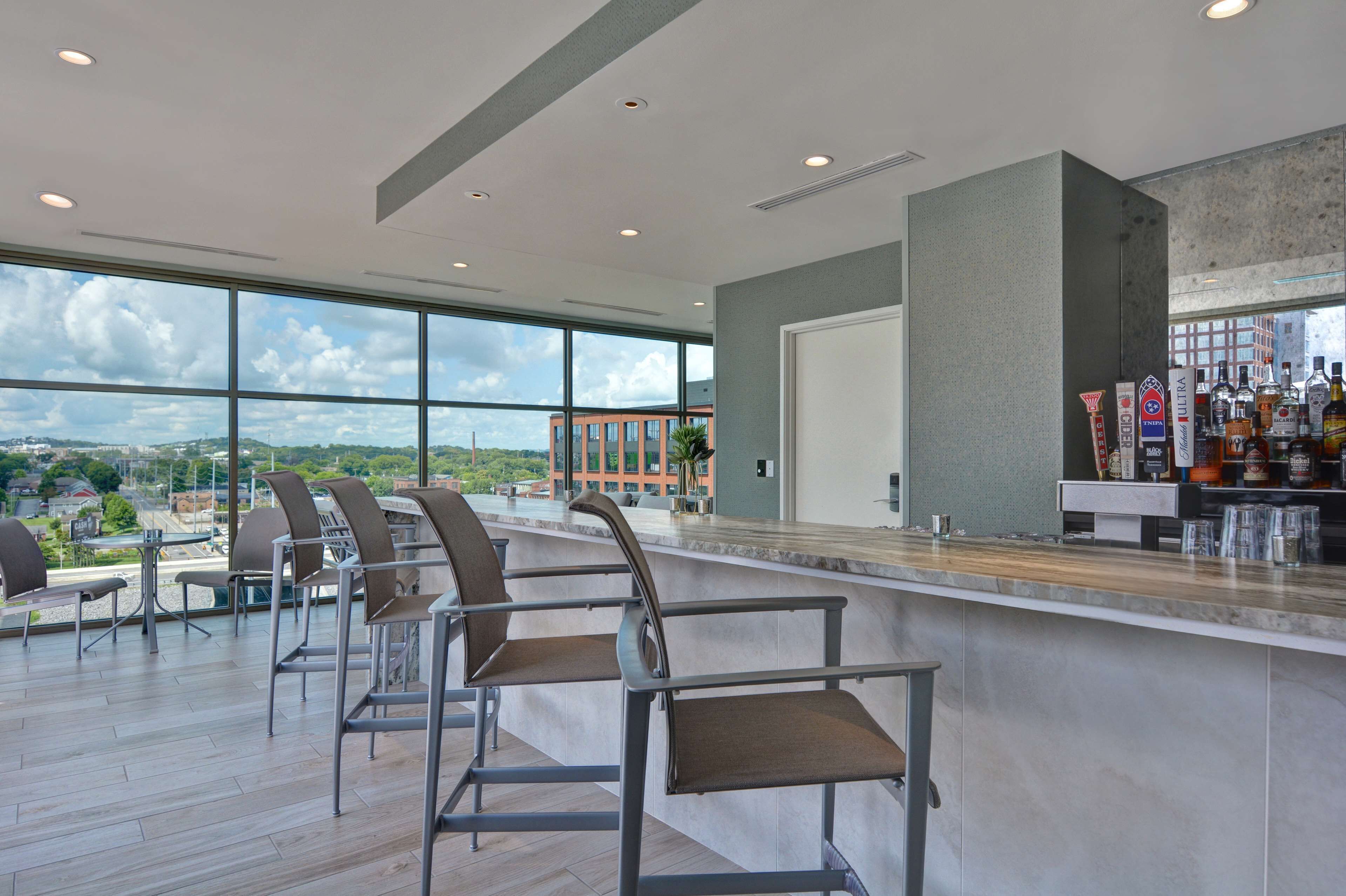 Rooftop bar, pool views, open daily