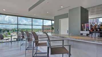 Rooftop bar, pool views, open daily