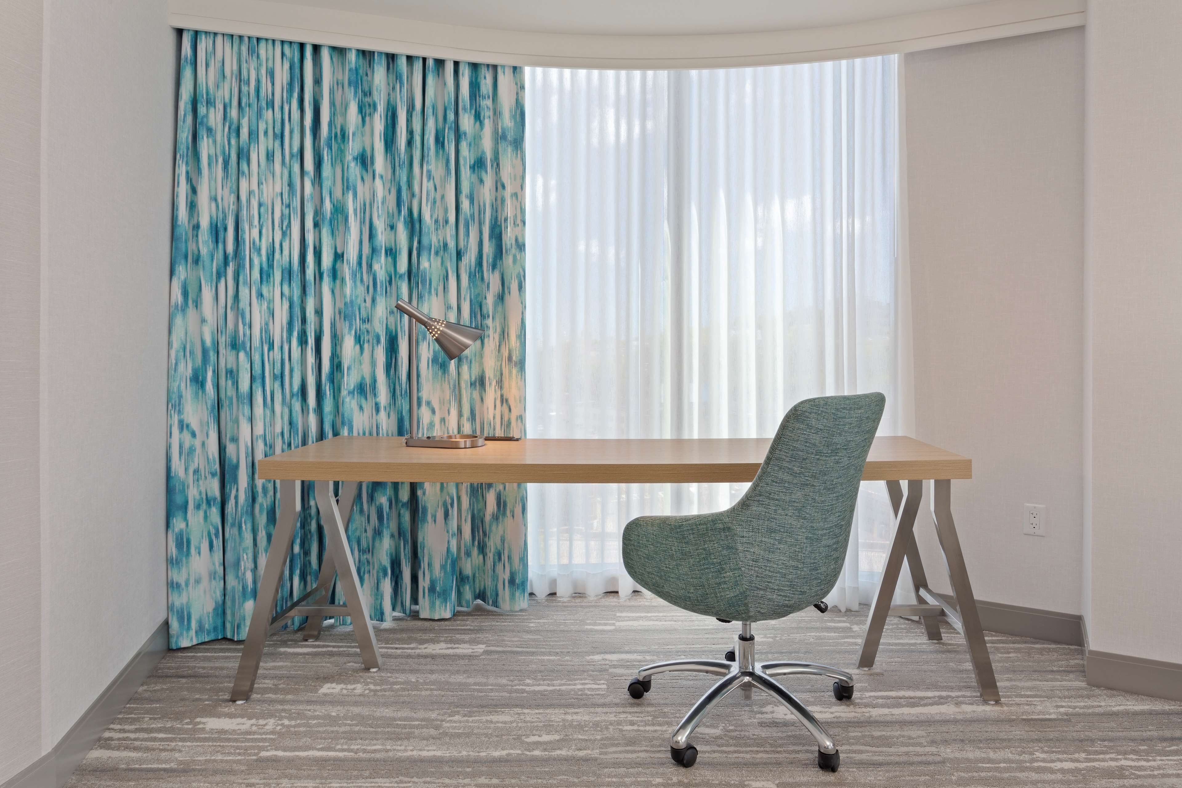 individually furnished, desk, laptop workspace, blackout curtains