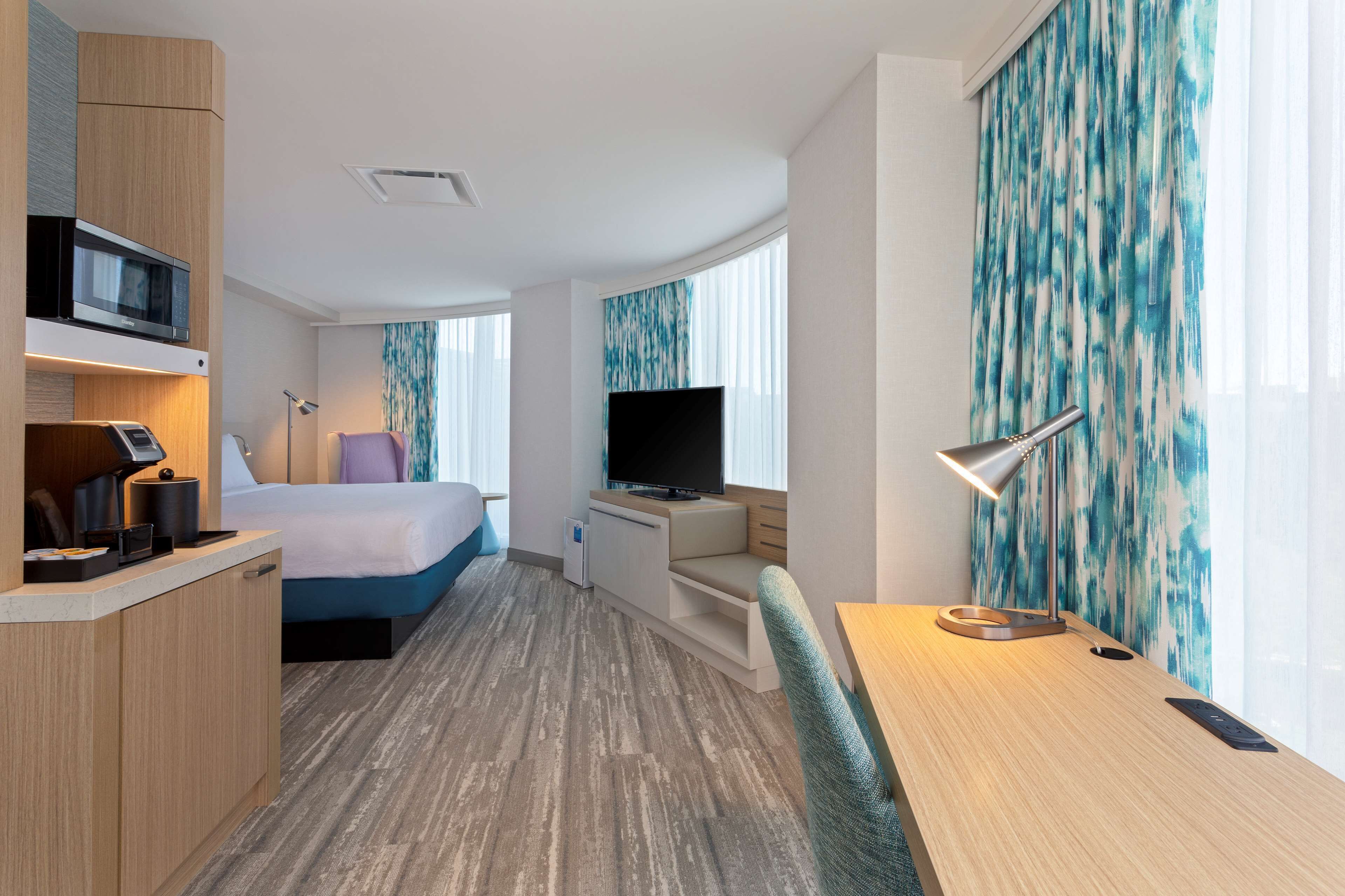 premium room, 1 king bed | individually furnished, desk, laptop workspace, blackout curtains