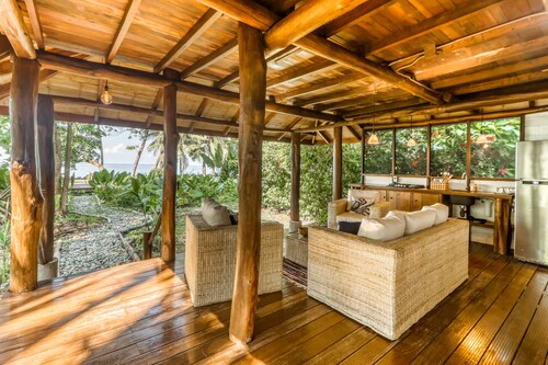 Tropical Beachfront Hacienda w/ lanai - steps from Pacific beach