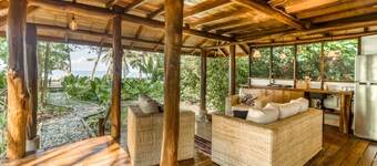 Tropical Beachfront Hacienda w/ lanai - steps from Pacific beach