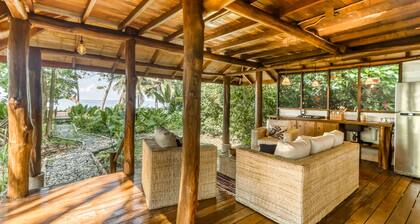 Tropical Beachfront Hacienda w/ lanai - steps from Pacific beach