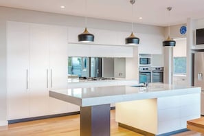 Coffee/tea maker, fridge, microwave, oven