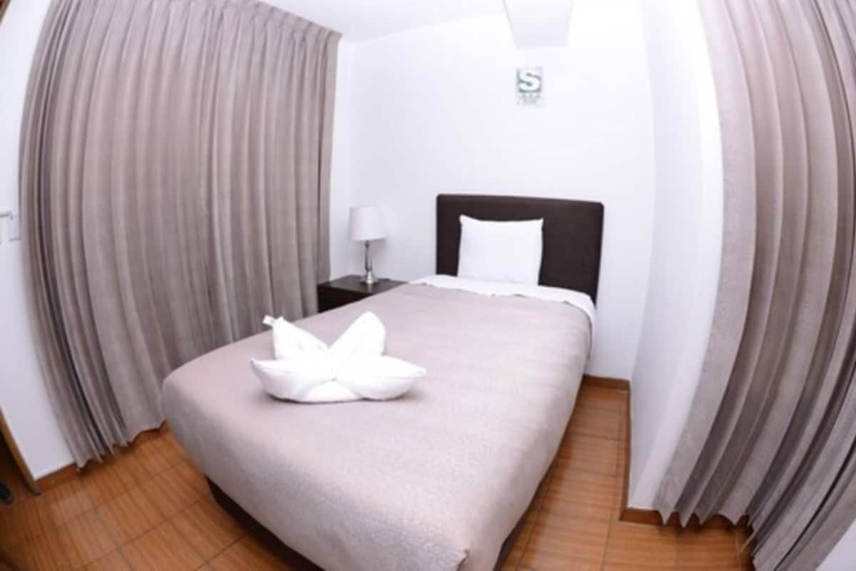 Standard Room (Simple) | Desk, laptop workspace, blackout drapes, WiFi (free)