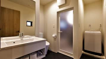 Separate tub and shower, free toiletries, hair dryer, slippers