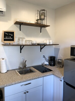 Fridge, microwave, coffee/tea maker, toaster