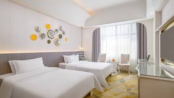 Literie de qualité supérieure, coffres-forts dans les chambres