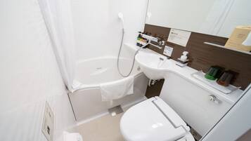 Combined shower/tub, free toiletries, hair dryer, slippers