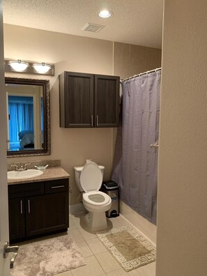 Hair dryer, towels, soap, toilet paper