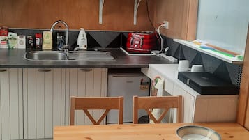 Fridge, microwave, electric kettle, toaster