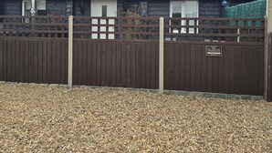A wooden house with a 'WILLOW' sign, a 'NO PARKING' sign, and a gravel driveway. - Willow Cottage,, Experience the North Downs in fully accessible comfort. (maidstone)