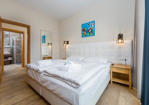 Literie hypoallergénique, coffres-forts dans les chambres