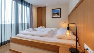 Superior Penthouse, 3 Bedrooms | Hypo-allergenic bedding, in-room safe, blackout drapes