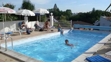 Seasonal outdoor pool, open 8:30 AM to 8:00 PM, sun loungers