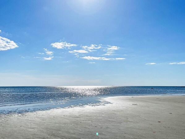 A beach with a clear sky and calm sea. - 8 Person Holiday Home in Tvaaker (Tvaaker)