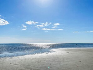 A beach with a clear sky and calm sea. - 8 Person Holiday Home in Tvaaker (Tvaaker)