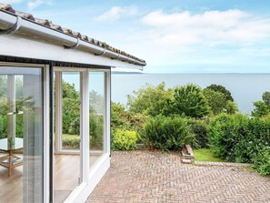 Hus | Utsikt mot vann