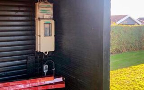 A utility meter attached to a building's exterior wall. - 4 Person Holiday Home in Hejls-by Traum (Hejls)