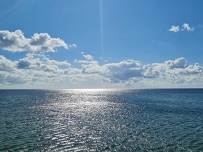 A calm sea under a clear sky with scattered clouds. - 4 Star Holiday Home in Vaeggerlose (Vaeggerlose)