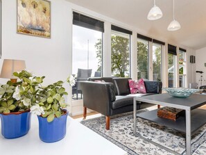 Ferienhaus | Wohnbereich | Flachbildfernseher