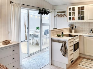 House | Private kitchen | High chair - 4 Person Holiday Home in Blokhus-by Traum (Blokhus)