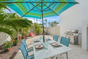 Each unit has their own outdoor area, with outdoor dining furniture.