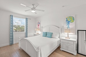 Master bedroom has a comfy king bed