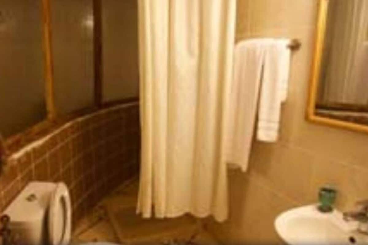 Shower, free toiletries, towels, soap