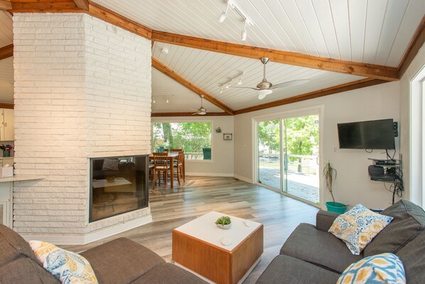 Smart TV, fireplace, books