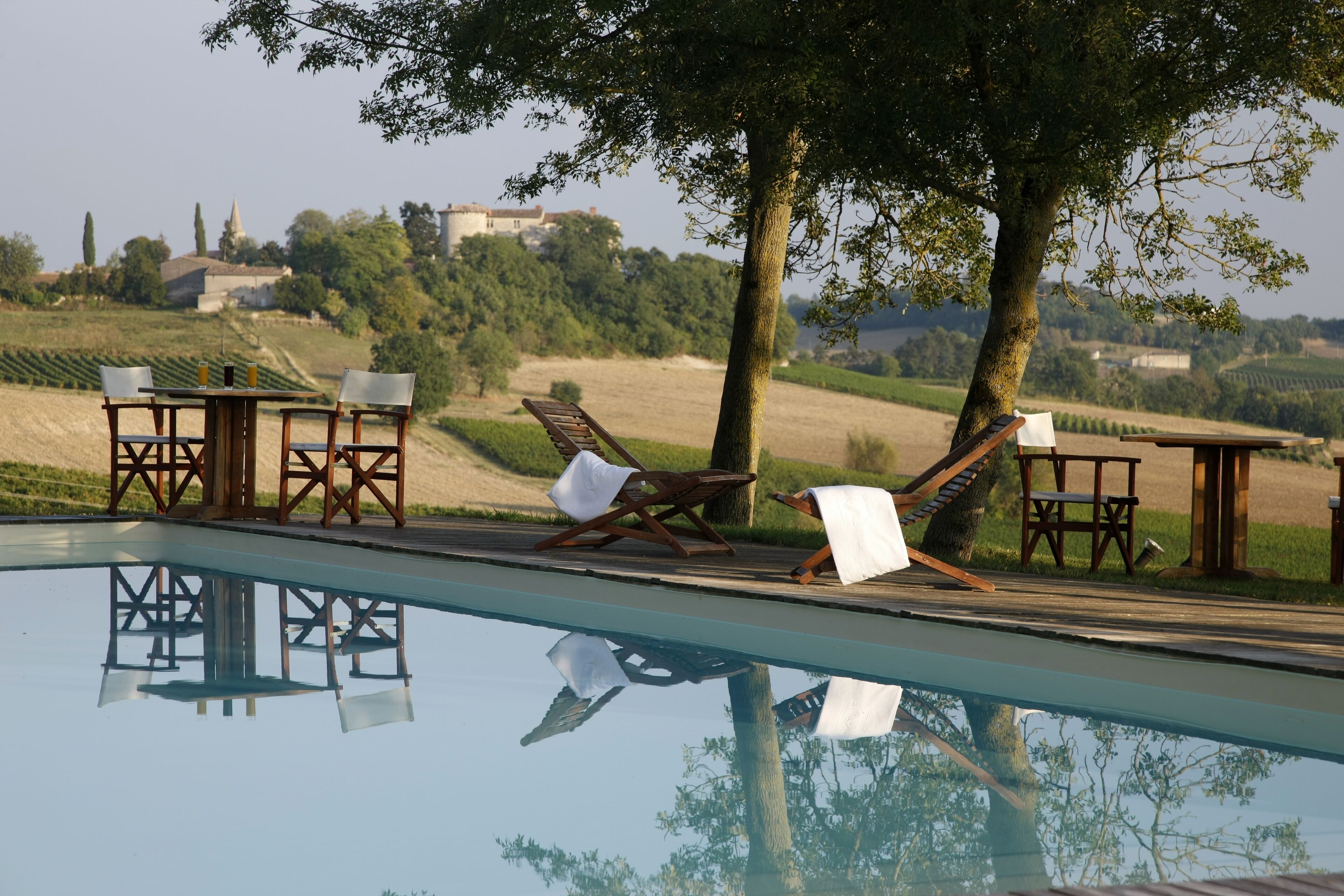 Seasonal outdoor pool, open 7:30 AM to 9:00 PM, sun loungers