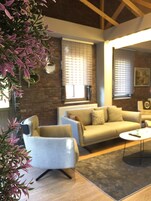 Grand Suite | Living room | 80-cm TV with satellite channels, heated floors