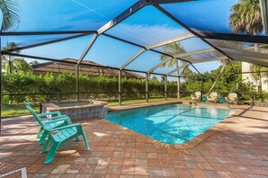 Outdoor pool, a heated pool - 4 BR/3 BA Including Separate Guest Suite, Heated Pool & Spa! (Marco Island)