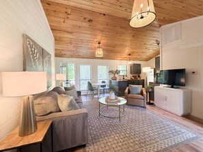 TV, fireplace - A Modern Retreat in the Woods with Firepit (Mountain View)
