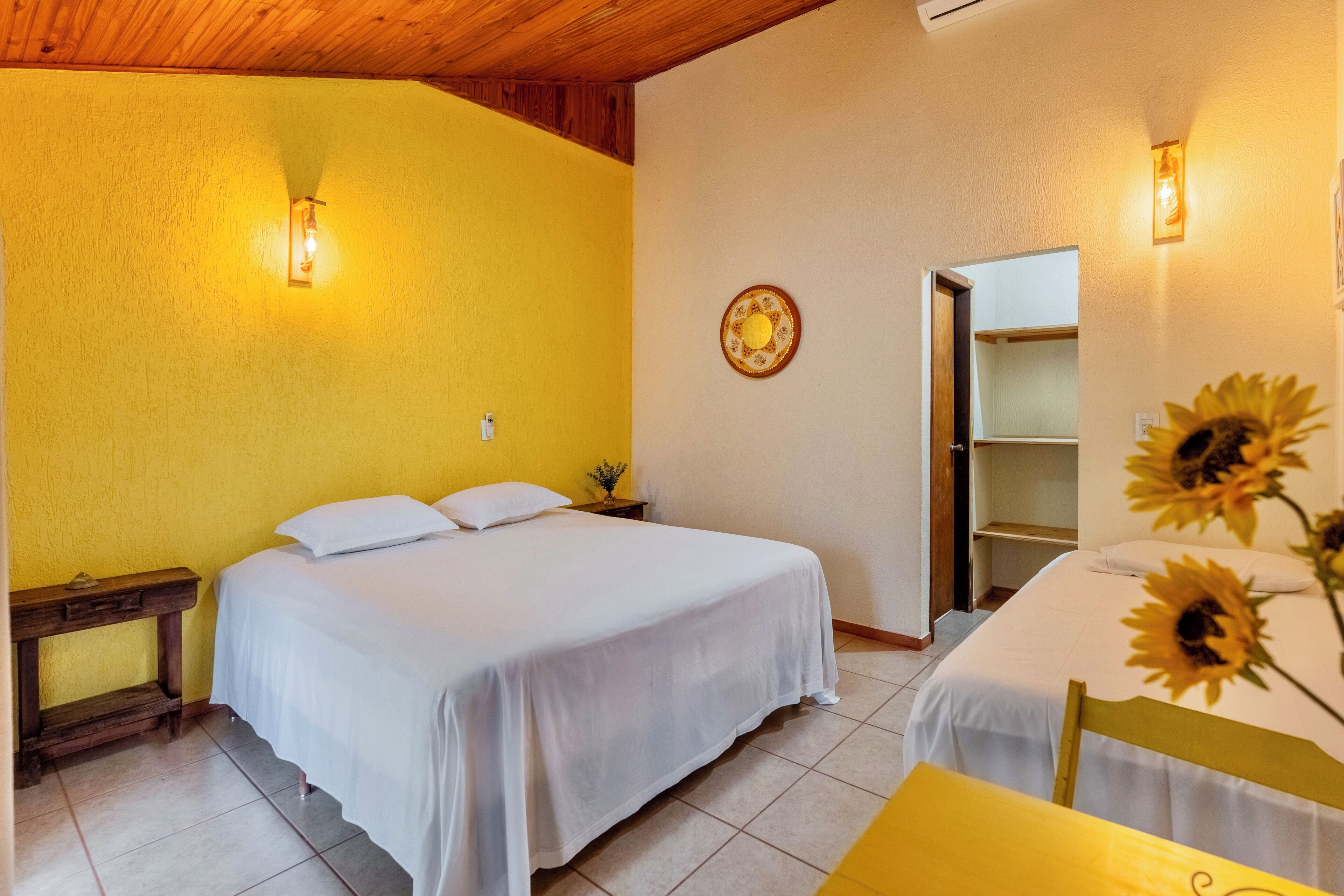 Family Triple Room, Lanai, Garden View | In-room safe, individually decorated, laptop workspace