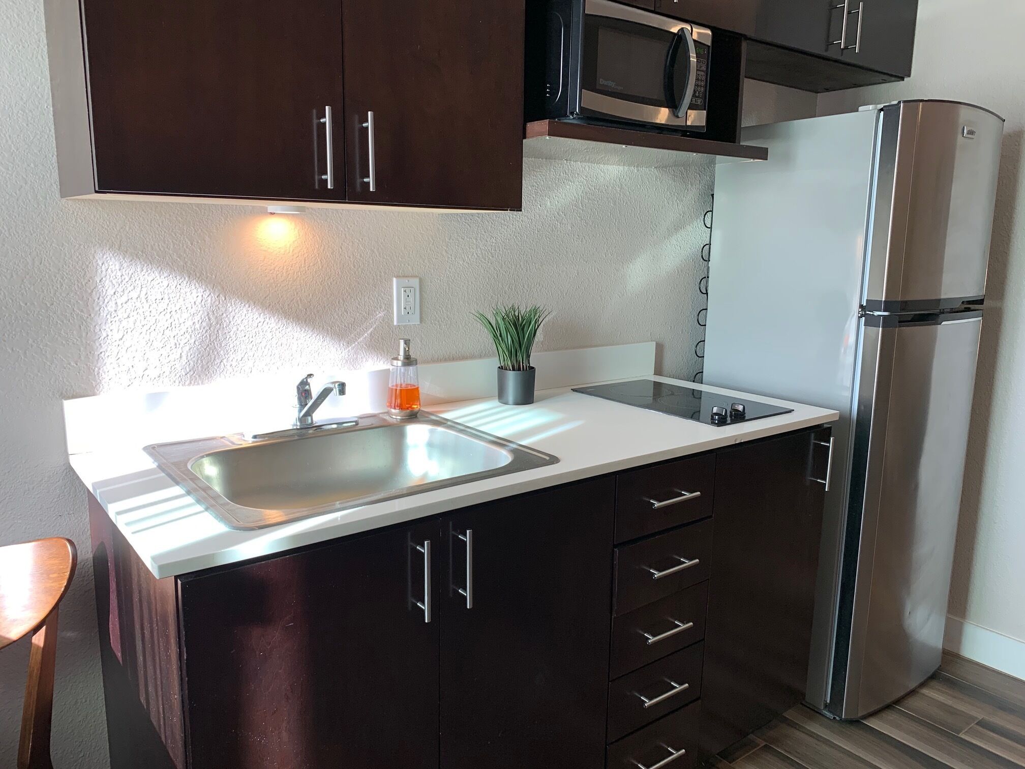 Fridge, microwave, stovetop, coffee/tea maker