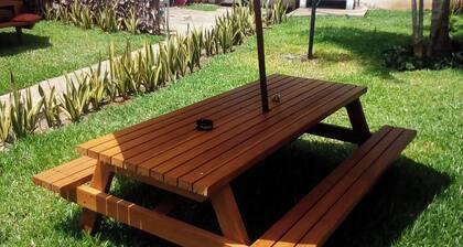 Two very quiet guest rooms in Nosy Be with shared kitchen and garden